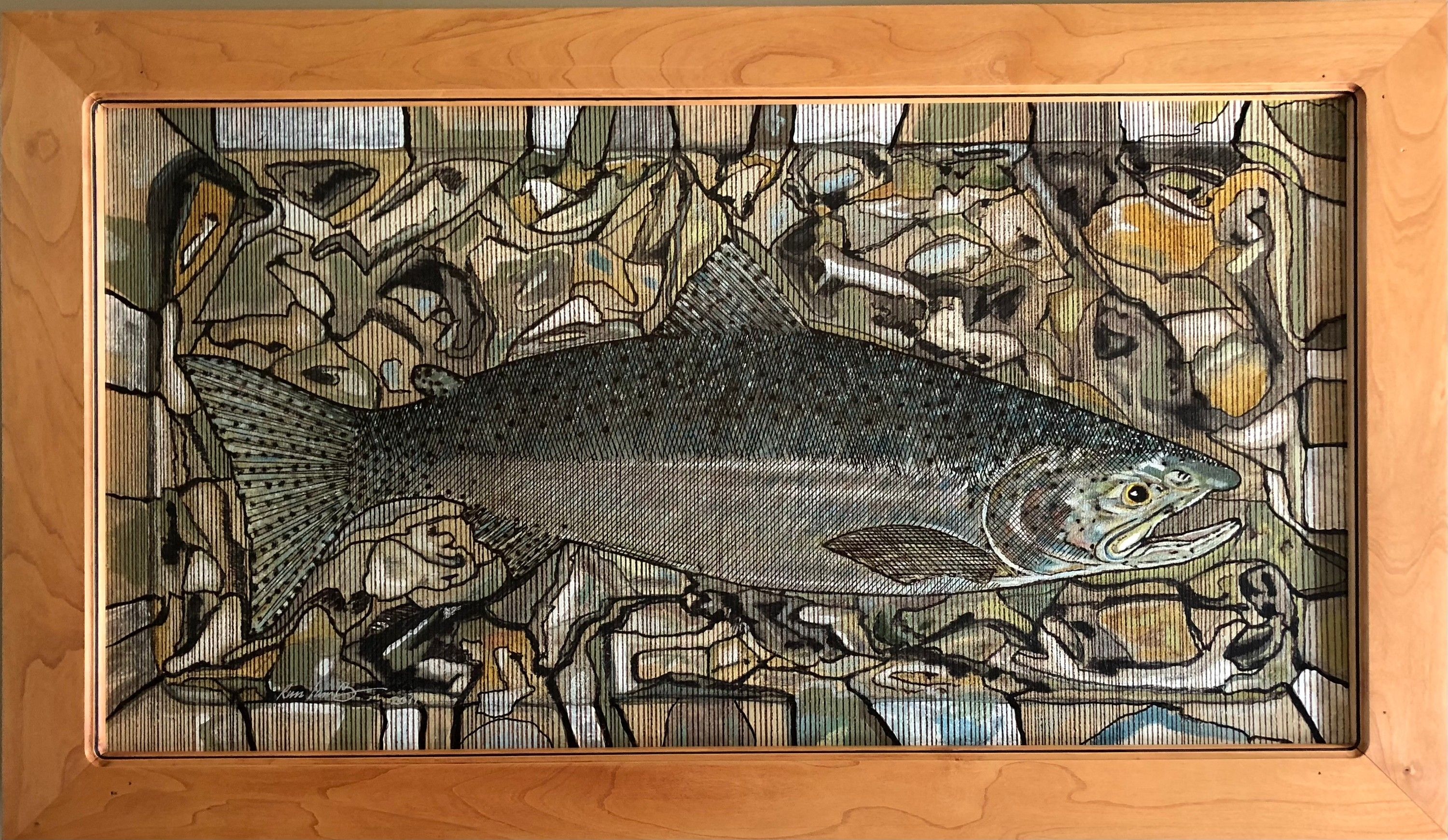 A painting of a salmon lying across pale river stones, worked in dark line and muted colour, in a wide pale wooden frame