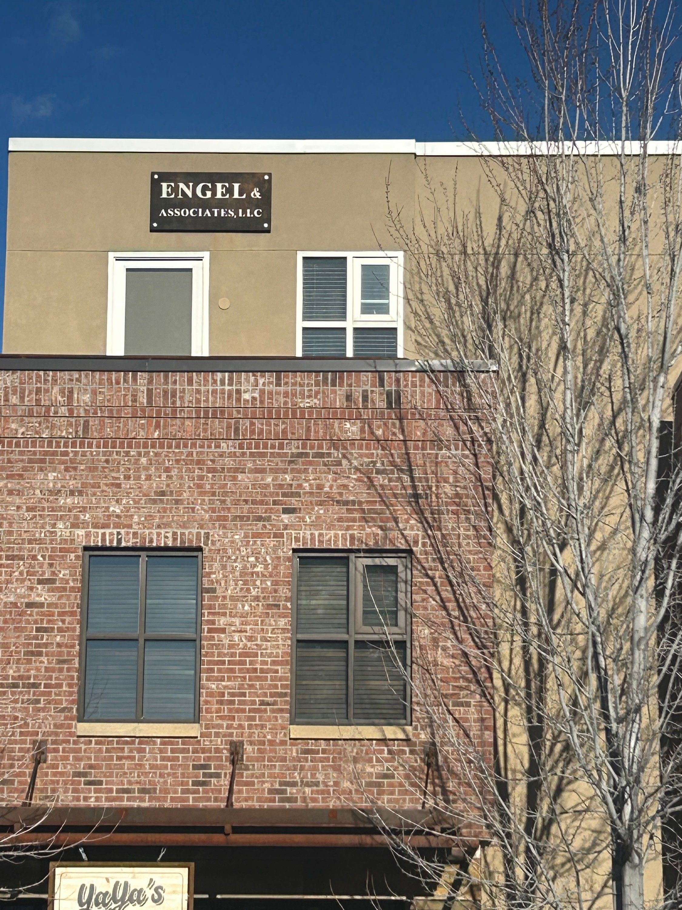 The Engel & Associates sign mounted high on the office building in Hailey